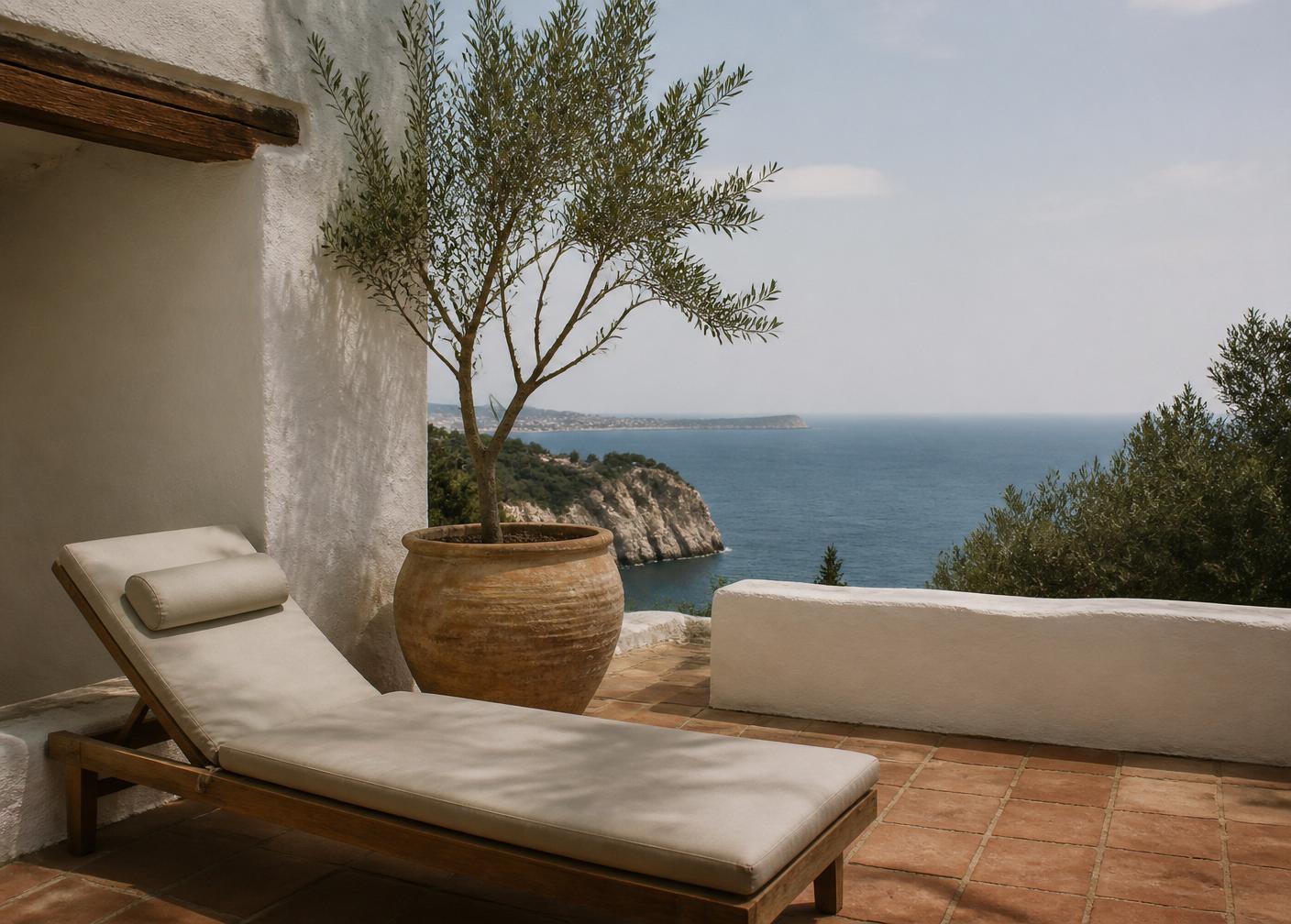 A shaded terrace with a view of the Mediterranean sea